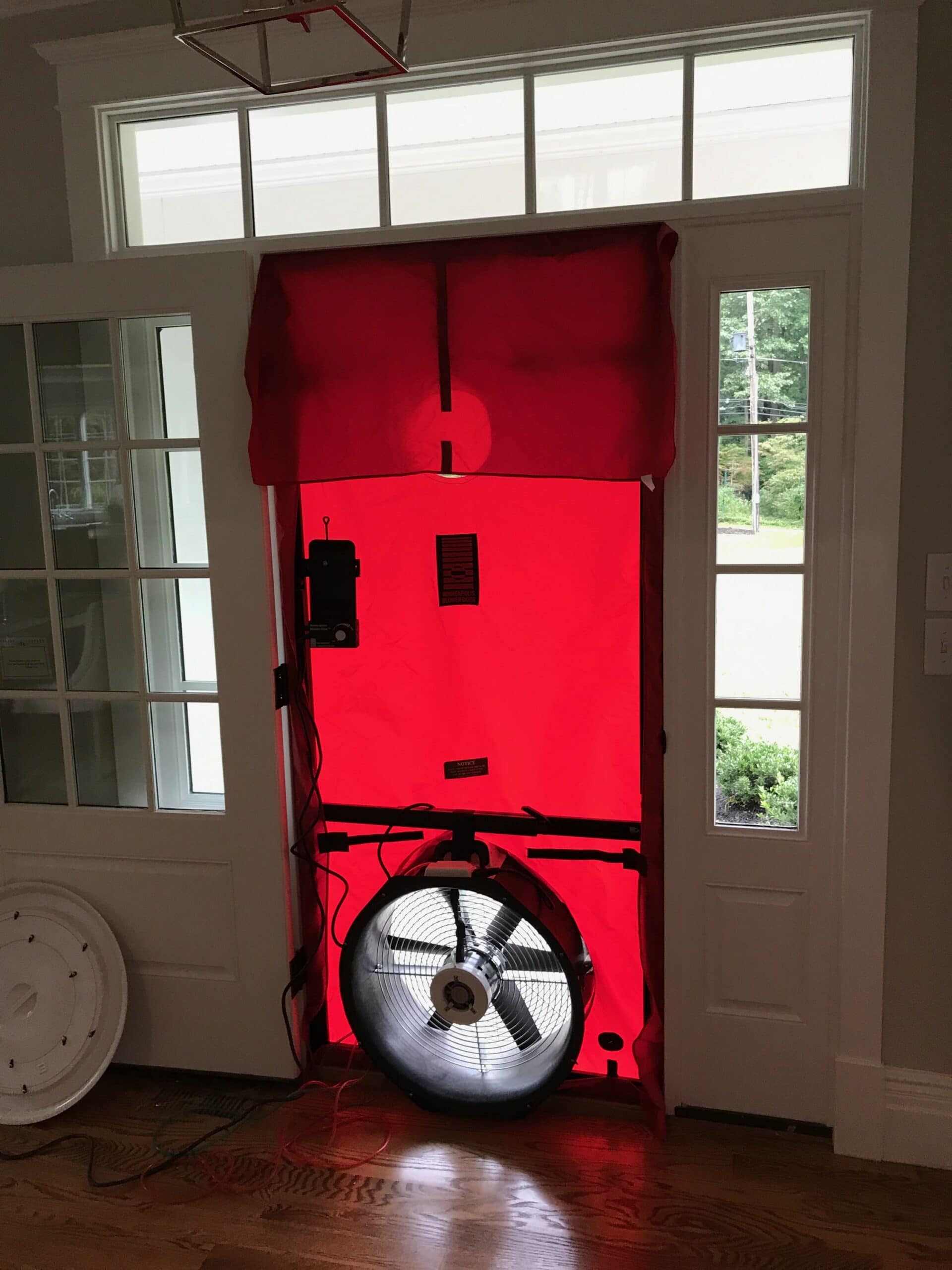 Blower door inside energy audit.