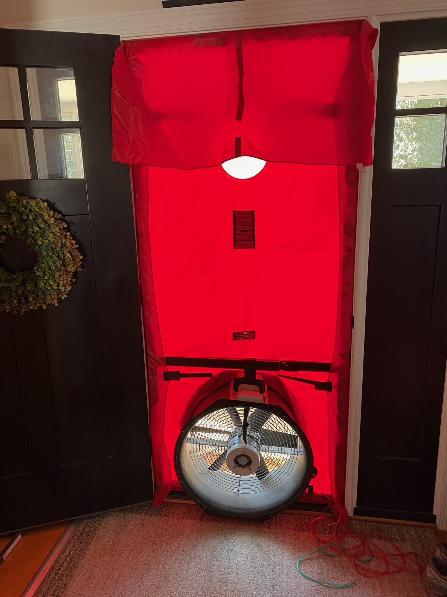 Blower door test for house leakage.